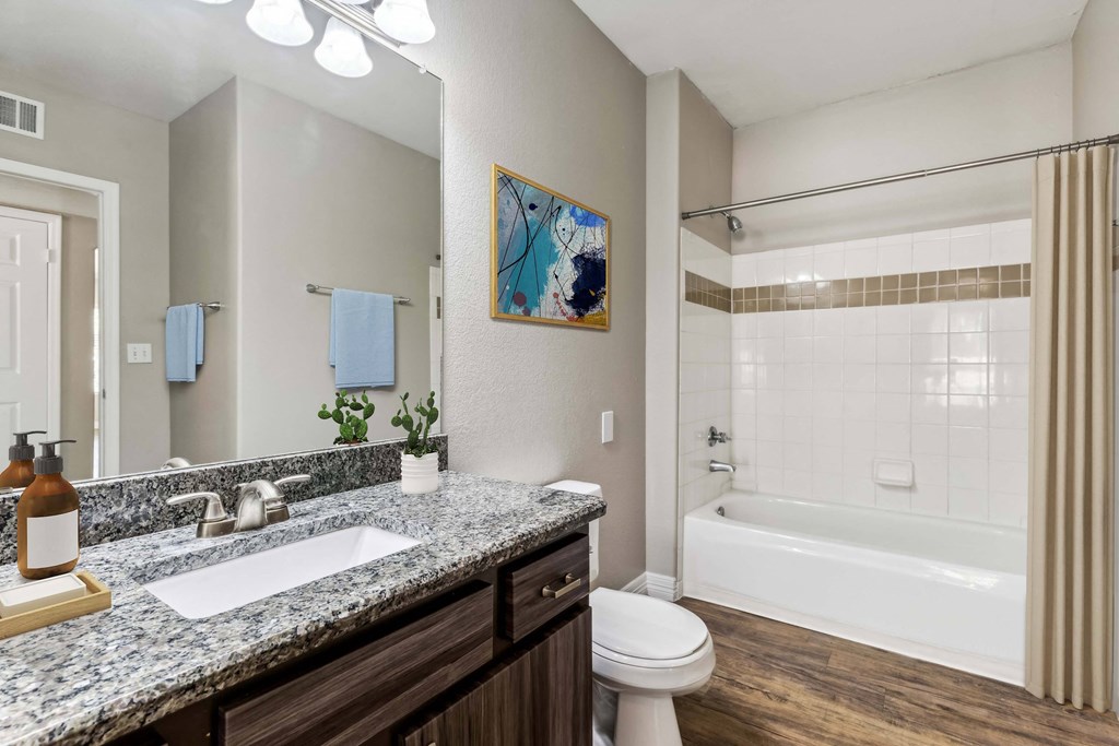 a bathroom with a sink and a shower and a toilet a bathroom with a sink and a shower and a toilet at Altezza High Desert, New Mexico, 87111